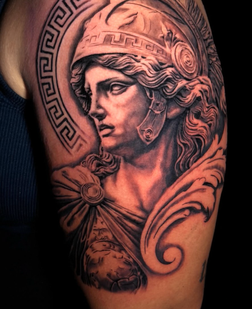 Black and grey Athena tattoo by Nate