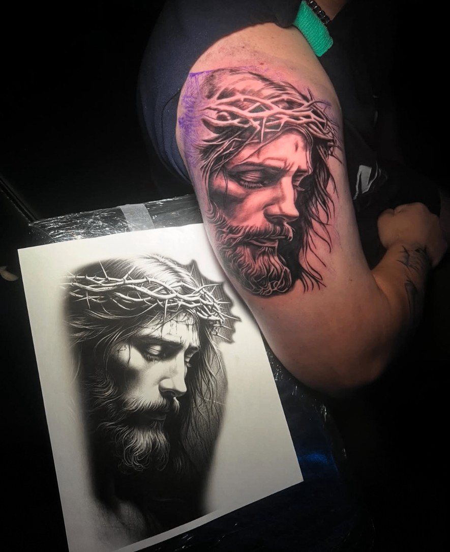 Black and grey Jesus with crown of thorns, upper arm